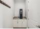 Hallway featuring granite countertop, cabinets for storage and a small wine cooler at 10669 Cardera Dr, Riverview, FL 33578