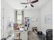 Home office with desk, chair, and workout equipment at 10669 Cardera Dr, Riverview, FL 33578