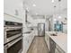 Spacious kitchen with stainless steel appliances and a large center island at 10669 Cardera Dr, Riverview, FL 33578