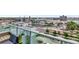Enjoy city views from this inviting balcony featuring comfortable seating and vibrant potted plants at 111 N 12Th St # 1805, Tampa, FL 33602