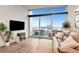 Bright living room with balcony access and comfortable seating at 111 N 12Th St # 1805, Tampa, FL 33602