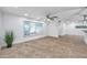 Large living room features tile floors, neutral walls and recessed lighting at 11245 Bella Loma Dr, Largo, FL 33774