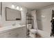Bright bathroom with a new vanity, a shower and tub combo, and modern fixtures at 11620 Park Blvd # 306, Seminole, FL 33772