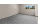 Bedroom featuring neutral walls and plush gray carpeting providing a soothing, move-in ready feel at 11620 Park Blvd # 306, Seminole, FL 33772