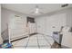 Bedroom room featuring a crib, rocking chair, and spacious closets at 13019 Wildflower Meadow Dr, Riverview, FL 33579