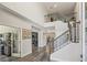 Grand foyer with staircase and wood flooring, high ceilings at 13019 Wildflower Meadow Dr, Riverview, FL 33579
