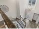 Grand two-story foyer with chandelier, staircase, and decorative front door at 13019 Wildflower Meadow Dr, Riverview, FL 33579