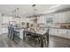 Spacious eat-in kitchen with white cabinets and stainless steel appliances at 13019 Wildflower Meadow Dr, Riverview, FL 33579