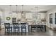Modern kitchen featuring an island with bar stool seating at 13019 Wildflower Meadow Dr, Riverview, FL 33579