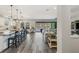 Open-concept living area with seamless flow to the outdoor pool area at 13019 Wildflower Meadow Dr, Riverview, FL 33579