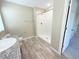 Well-lit bathroom featuring a granite topped sink and a tiled walk-in shower at 13118 Zolo Springs Cir, Riverview, FL 33579
