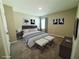 Staged bedroom featuring neutral tones, coordinated decor, and an inviting layout at 13118 Zolo Springs Cir, Riverview, FL 33579