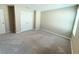 Spacious, carpeted bedroom with large closet, window, and neutral wall paint at 13118 Zolo Springs Cir, Riverview, FL 33579
