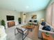Cozy living room with neutral decor and ample seating at 13118 Zolo Springs Cir, Riverview, FL 33579
