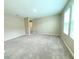 Spacious living room with carpet flooring and natural light at 13118 Zolo Springs Cir, Riverview, FL 33579
