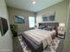 Bedroom with elegant decor, rug, and ample natural light at 13118 Zolo Springs Cir, Riverview, FL 33579