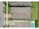 Overhead shot of home highlighting the roof, paver driveway, backyard, and lush landscaping at 13128 Foxtail Fern Dr, Riverview, FL 33579