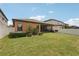This home features a well-maintained lawn, a patio, privacy fence, and great outdoor space at 13128 Foxtail Fern Dr, Riverview, FL 33579