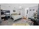 Inviting bedroom provides ample space for sleep and study featuring a fan and easy access to an ensuite bathroom at 1641 Jeffords St, Clearwater, FL 33756
