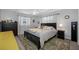 Bright and airy bedroom features neutral walls, stylish furniture, and lots of natural light at 1641 Jeffords St, Clearwater, FL 33756