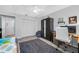 Relaxing bedroom featuring a ceiling fan, a workspace and closet space for comfortable living at 1641 Jeffords St, Clearwater, FL 33756