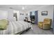 Bright bedroom features neutral walls and updated flooring along with ample natural light throughout at 1641 Jeffords St, Clearwater, FL 33756
