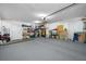 Spacious garage with ample storage, shelving, and organized space for parking and projects at 1641 Jeffords St, Clearwater, FL 33756