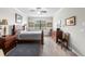 Inviting bedroom bathed in natural light, showcasing a comfortable layout and minimalist decor at 16898 Balance Cv, Land O Lakes, FL 34638
