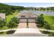 Charming single-Gathering home has well-maintained landscaping, a brick driveway and two-car garage at 16898 Balance Cv, Land O Lakes, FL 34638