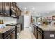 The spacious kitchen has a large island and modern appliances, perfect for cooking and entertaining guests at 16898 Balance Cv, Land O Lakes, FL 34638