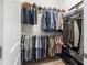 Spacious walk-in closet featuring ample storage and organization for clothes and accessories at 16898 Balance Cv, Land O Lakes, FL 34638