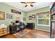 Dedicated office with a desk, bookshelves, and natural light, providing an ideal workspace for productivity at 17203 Talence Ct, Tampa, FL 33647