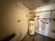 This is a picture of the basement which includes a water heater at 1835 15Th S Ave, St Petersburg, FL 33712