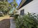 Exterior shot featuring white siding and well established landscaping at 1835 15Th S Ave, St Petersburg, FL 33712