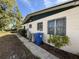 Back exterior featuring white siding and foliage at 1835 15Th S Ave, St Petersburg, FL 33712