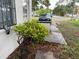 Exterior of the house with foliage and a car parked on the street at 1835 15Th S Ave, St Petersburg, FL 33712
