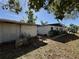 Rear exterior view of the property and detached structure at 1835 15Th S Ave, St Petersburg, FL 33712