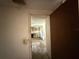 Image of a kitchen with dated appliances, cabinets and flooring, requiring renovation at 1835 15Th S Ave, St Petersburg, FL 33712