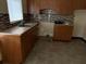 Features of the kitchen include a stainless steel sink and tiled backsplash at 1835 15Th S Ave, St Petersburg, FL 33712