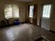 The living room features two windows and a door leading to the outside at 1835 15Th S Ave, St Petersburg, FL 33712