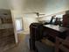 Image of a Living Room, filled with furniture, in need of renovation at 1835 15Th S Ave, St Petersburg, FL 33712