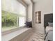 Bright bedroom with a cozy window nook offering natural light and peaceful views at 19204 Weymouth Dr, Land O Lakes, FL 34638