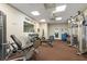 Fully equipped community gym with free weights and weight machines, with a motivational slogan on the wall at 19204 Weymouth Dr, Land O Lakes, FL 34638
