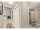 The hallway leads to a bathroom and various rooms in this home at 19204 Weymouth Dr, Land O Lakes, FL 34638