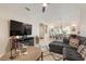 Open-concept living room with comfortable seating and dining area at 19204 Weymouth Dr, Land O Lakes, FL 34638