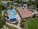 Aerial view of the resort-style pool, lounge areas, and clubhouse at the community at 20025 Callisto Hill Pl, Tampa, FL 33647