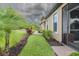 Well-maintained house exterior with manicured lawn, vibrant plants and shrubbery at 20025 Callisto Hill Pl, Tampa, FL 33647