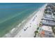 Aerial view showcasing beach proximity to homes, with the Gulf of Mexico in view at 204 Haven Beach Ct, Indian Rocks Beach, FL 33785