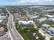 Coastal community aerial view showing proximity to the beach, pond, and dock at 204 Haven Beach Ct, Indian Rocks Beach, FL 33785