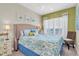Cozy bedroom featuring a queen bed and soft, natural lighting at 204 Haven Beach Ct, Indian Rocks Beach, FL 33785